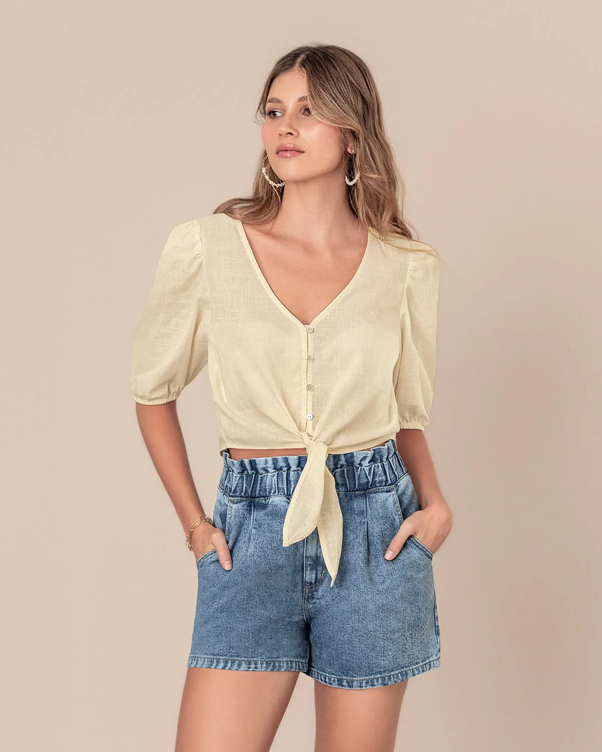 Blusa manga corta tipo globo con perilla funcional