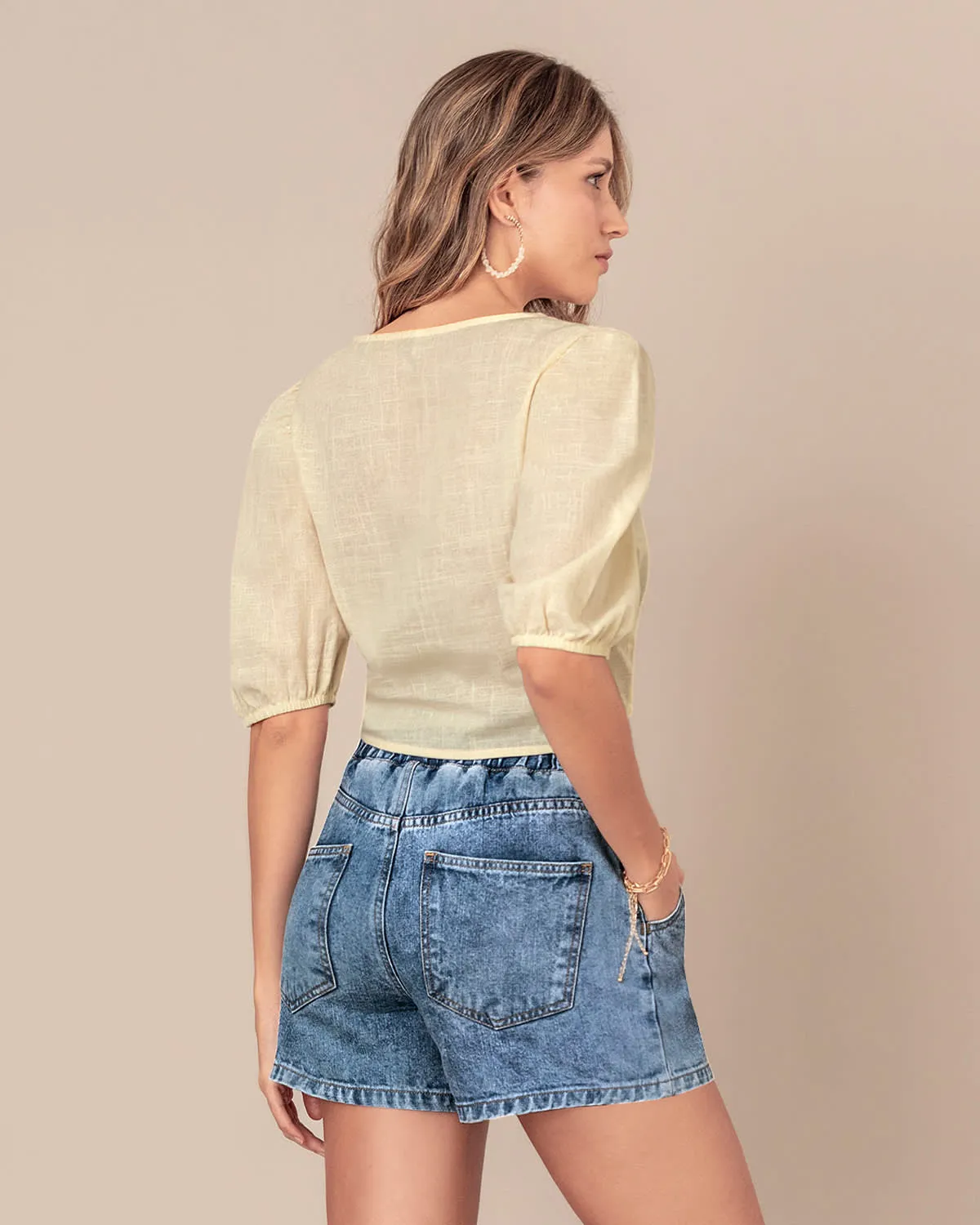 Blusa manga corta tipo globo con perilla funcional