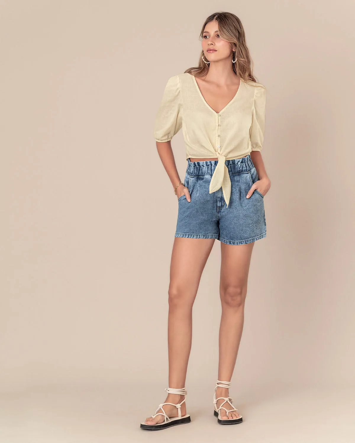 Blusa manga corta tipo globo con perilla funcional