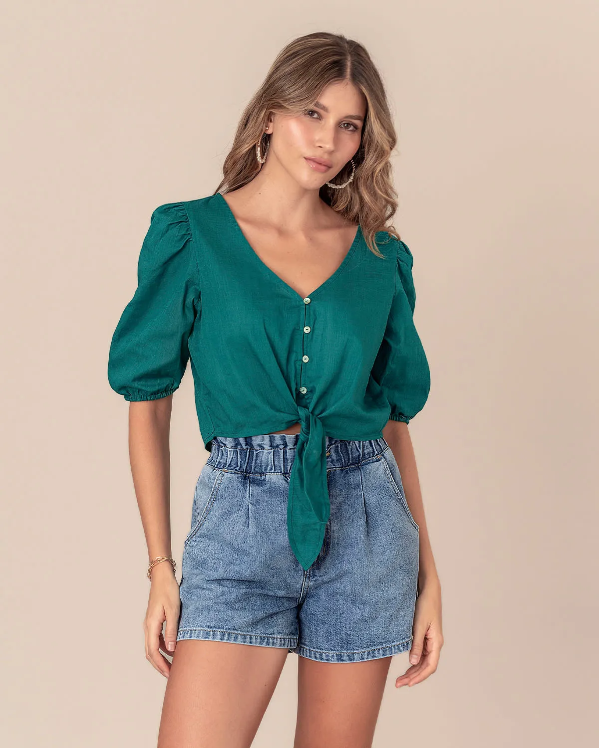 Blusa manga corta tipo globo con perilla funcional