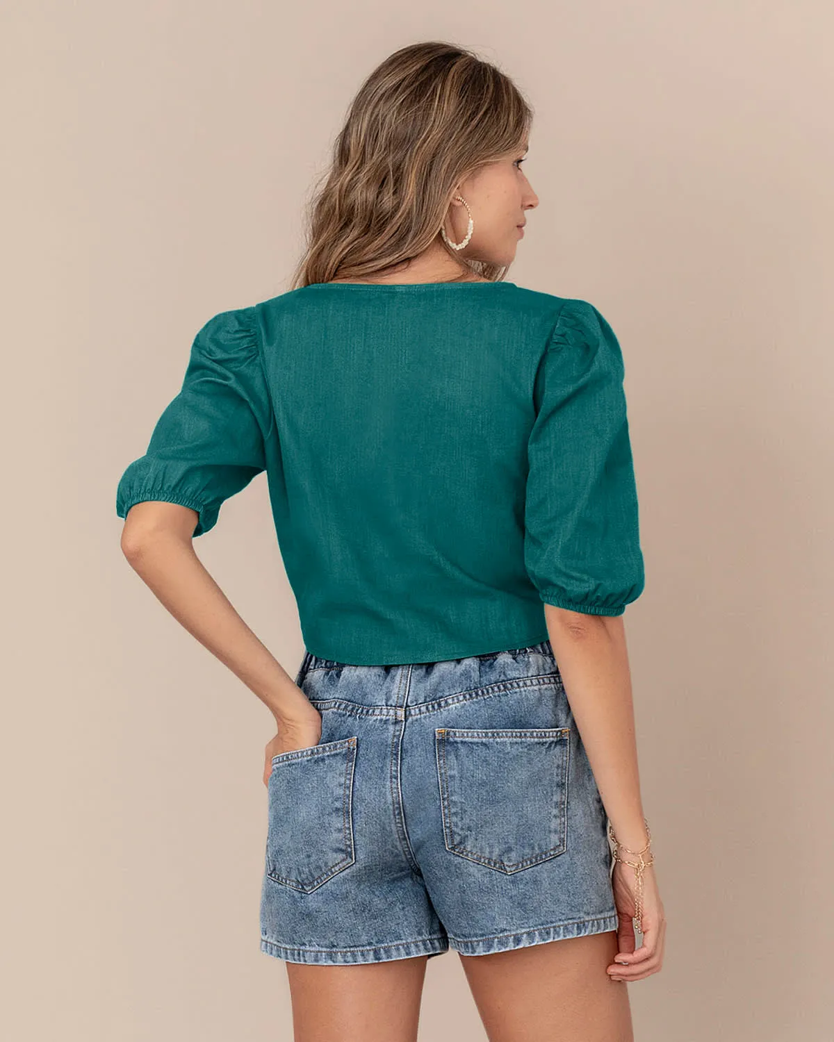 Blusa manga corta tipo globo con perilla funcional