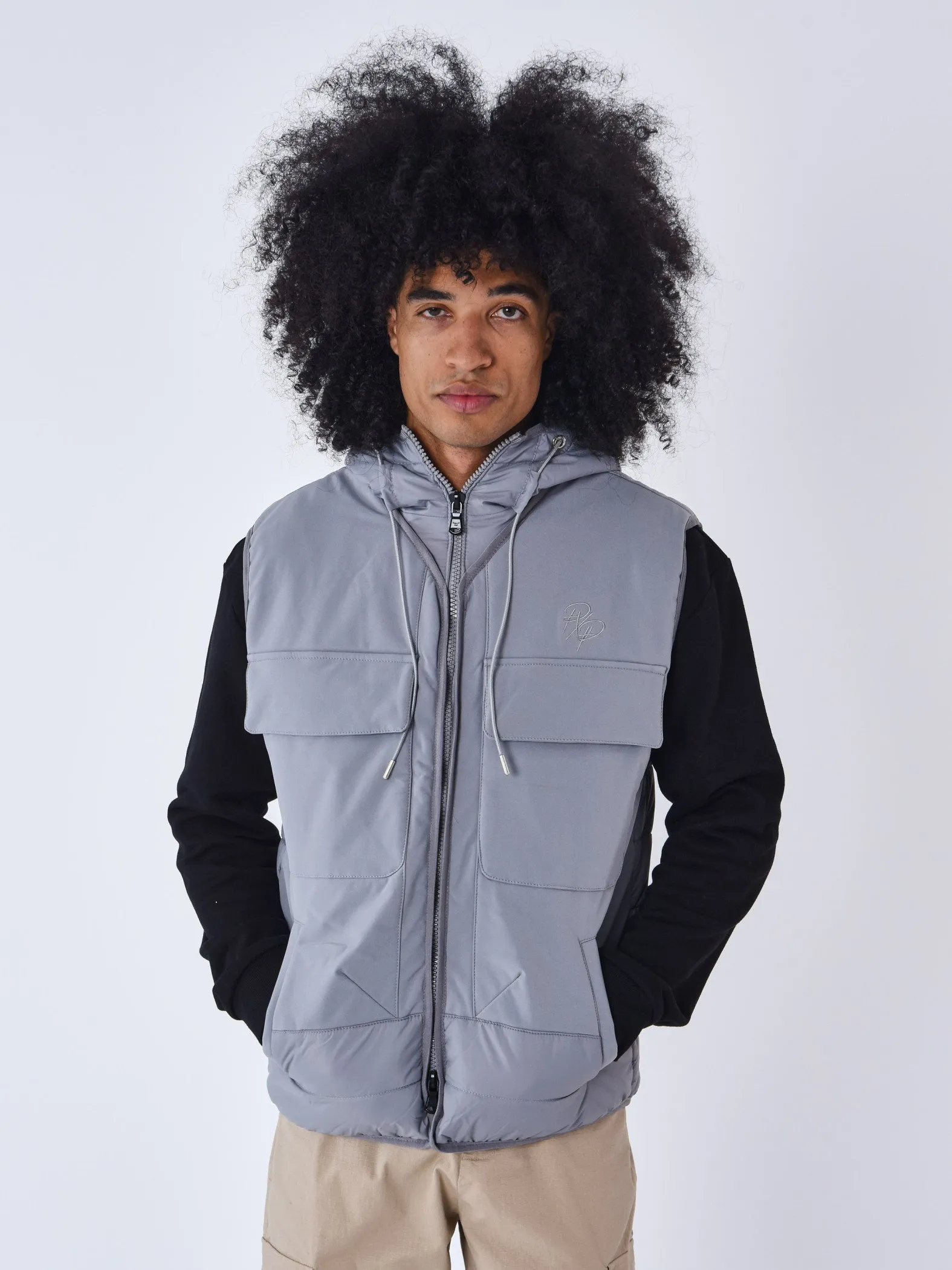Chaqueta de plumón sin mangas bimateria