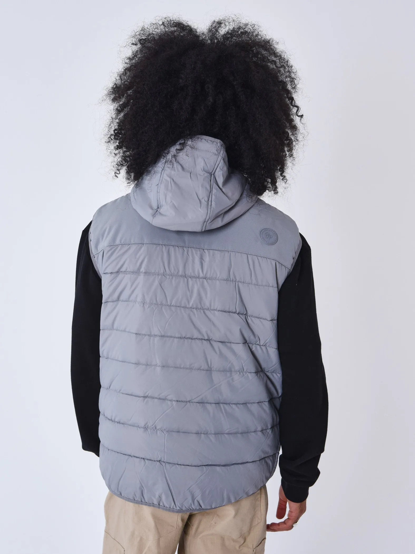 Chaqueta de plumón sin mangas bimateria