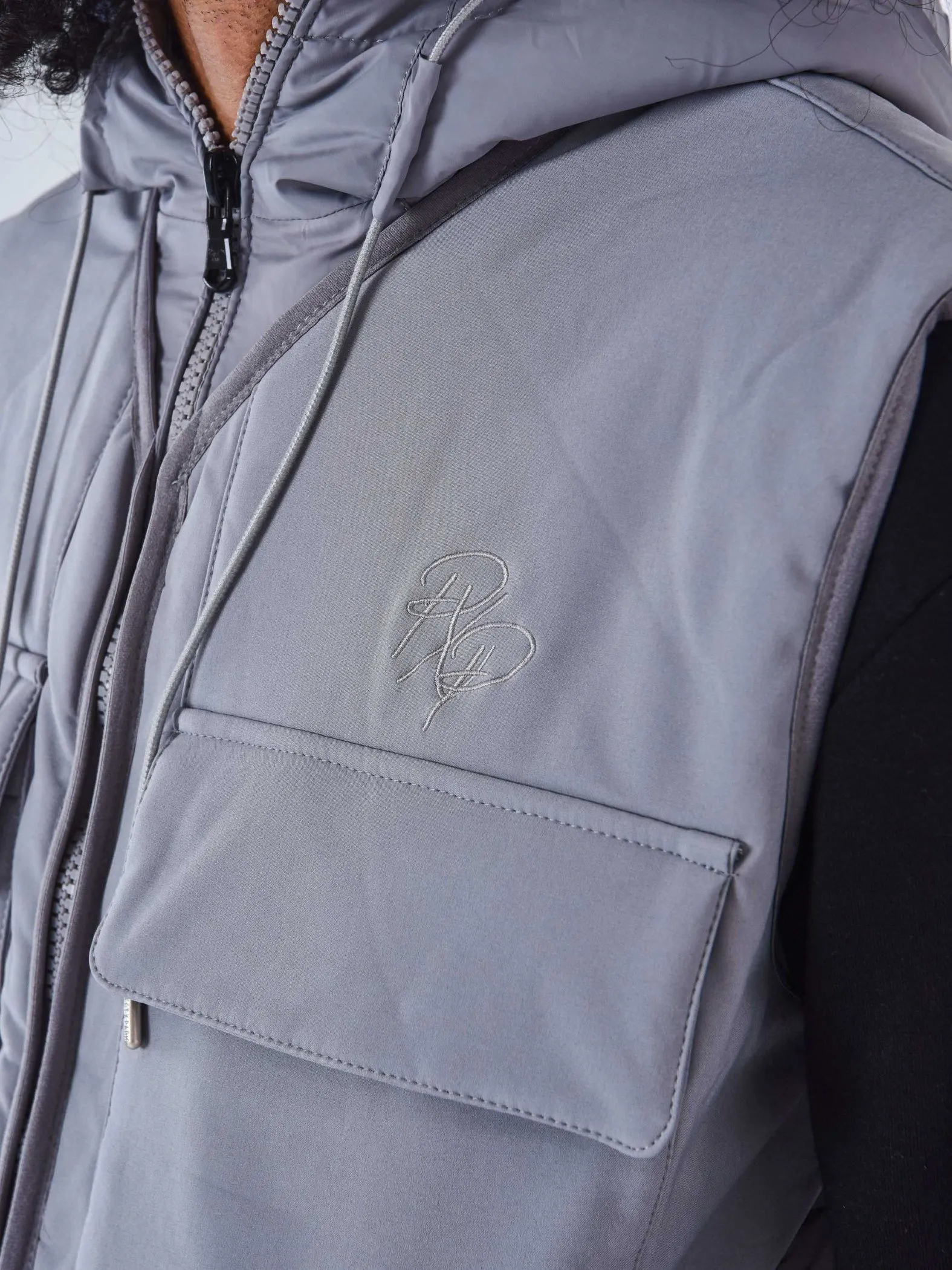Chaqueta de plumón sin mangas bimateria